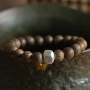 Nha Trang Qinan Agarwood Bracelet with 999 Fine Silver Ingot Charm 9mm x 21 Beads